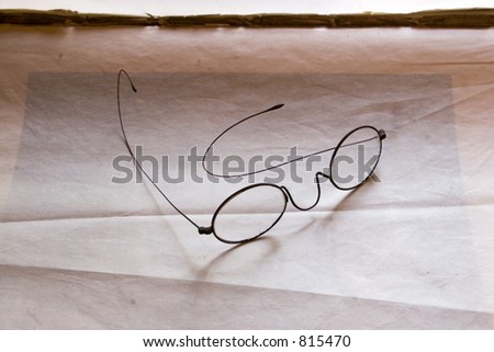 Stock image of glasses on a desk at  Natches Trace National Scenic Trail.  Native American paths that were later used by white settlers to extend their commerce and trade.