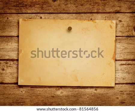 Old paper on the wood background