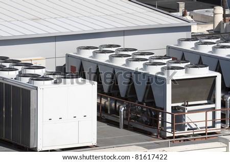 view on the roof of a building of a large air conditioning equipment Royalty-Free Stock Photo #81617422