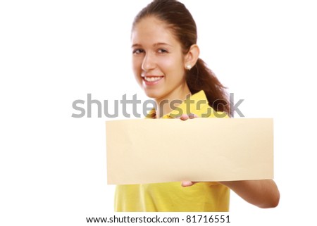 A smiling girl holding an empty blank, isolated on white