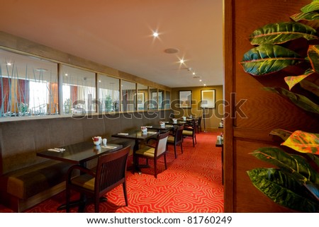 restaurant interior with tables and clean crockery
