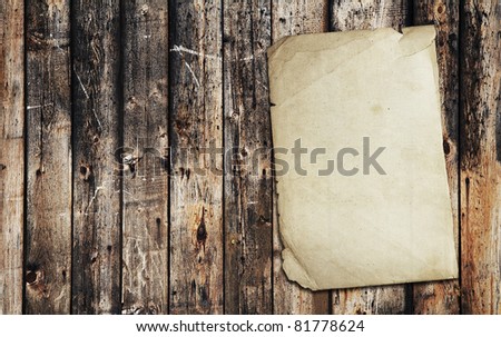 vintage paper on old wood texture