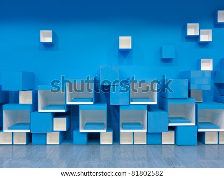 3D blue and white cubes in a random pattern on a blue background
