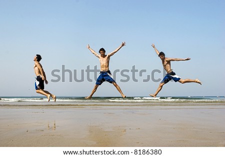 Combinations of tree picture in one of a young man jumping on the beach