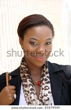 A young black business woman against white background
