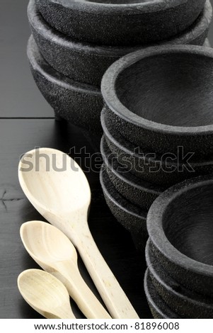 plastic molcajetes and wood spoons ideal to serve salsas, guacamole,  pico de gallo and other delicious mexican sauces.