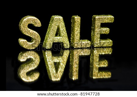 In capital letter written Sale, glitter effect over black Royalty-Free Stock Photo #81947728