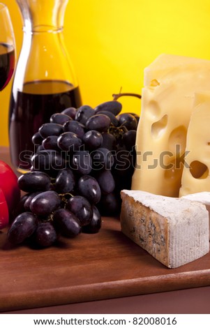 Cheese composition on wooden table