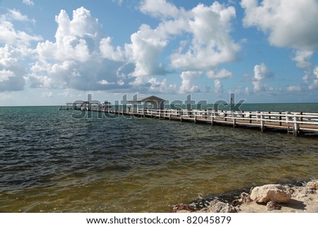 Inviting dock on the Atlantic Ocean in the Florida Keys Royalty-Free Stock Photo #82045879