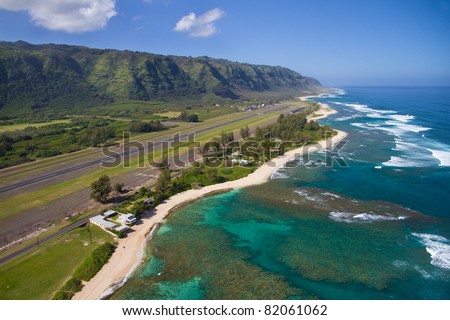 North Shore aerial of Oahu, Hawaii - near Dillingham Airfield - Makuleia Beach in foreground, Hidden Beach and Kaena Point in distance Royalty-Free Stock Photo #82061062