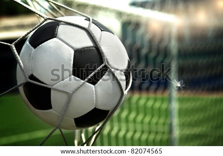 football. The ball flies into the net gate