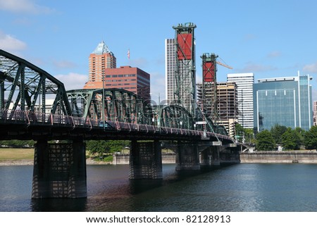 The Hawthorne bridge and Portland OR., skyline.
