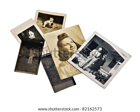 A group of old family photos and negatives on white background.