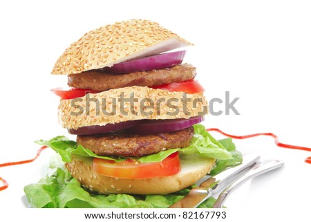 big double grilled hamburger on ceramic plate isolated  over white background