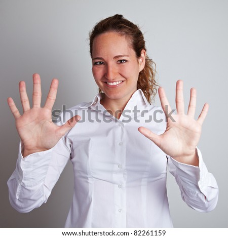 Business woman showing her open hands with ten fingers