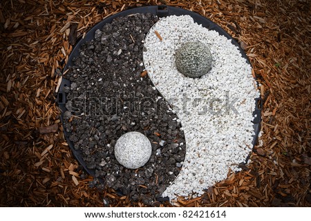 yin yang made from little stones Royalty-Free Stock Photo #82421614