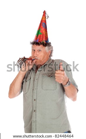 A funny image of an older gentlemen partying for his birthday.  He is giving a thumbs up.  Image is isolated on white.
