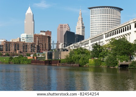 Cleveland From The River Commercial and residential buildings in the downtown area of Cleveland, Ohio as seen from the bank of the Cuyahoga River