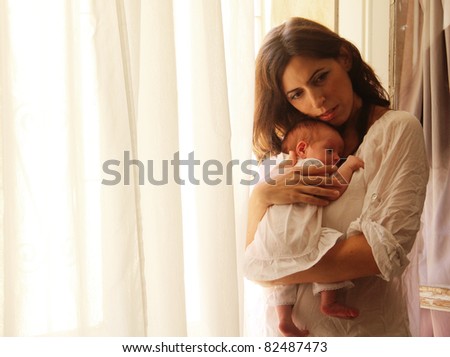 young mother with her newborn baby
