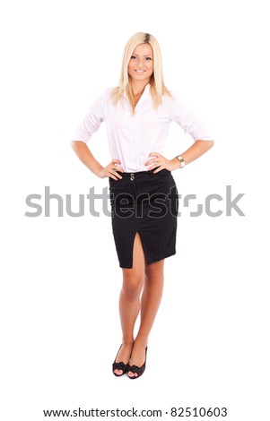 Full length portrait of a friendly businesswoman isolated on white background