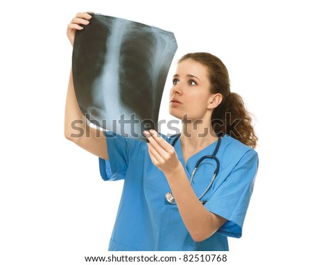 A female doctor examining x-ray, isolated on white