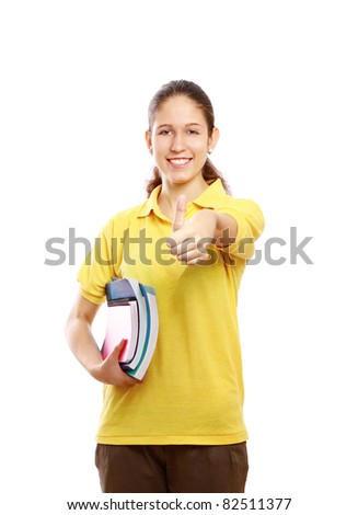 A smiling student girl with books and thumb up sign, isolated on white