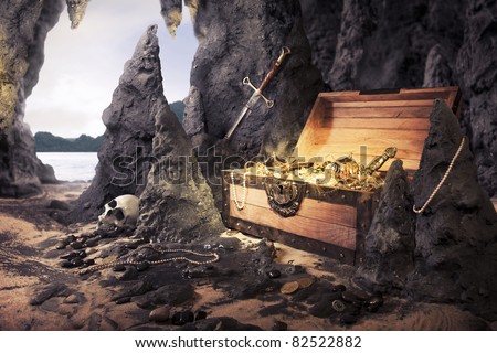 photo of open treasure chest with shinny gold in a cave Royalty-Free Stock Photo #82522882