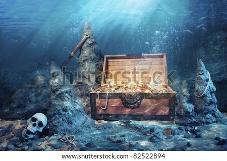 photo of open treasure chest with shinny gold underwater Royalty-Free Stock Photo #82522894