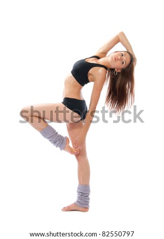 Pretty slim jazz modern contemporary style woman ballet dancer pose isolated on a white studio background