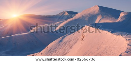 Winter landscape in the mountains. Sunrise