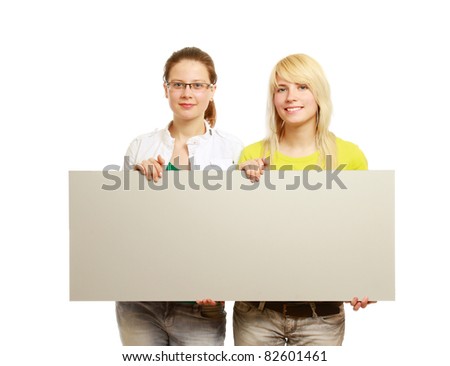 The group of young people holds the empty board for the text