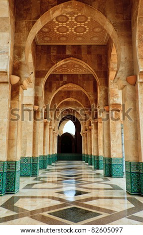 Casablanca, Morocco:  Intricate exterior marble and mosaic stone archway outside of Hassan II Mosque in Casablanca, Morocco. Royalty-Free Stock Photo #82605097