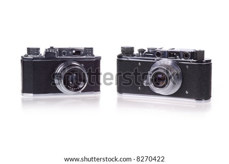 Two Classic film rangefinder cameras on white background
