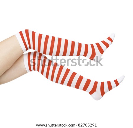 woman legs in color red socks isolated on white