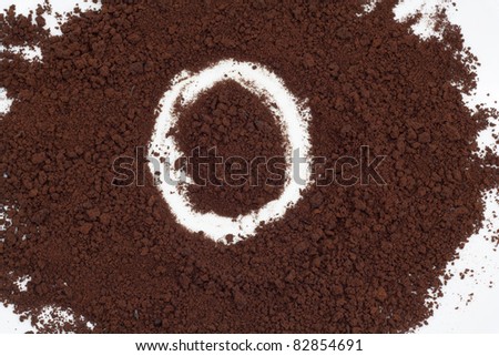 letter on the background of instant coffee