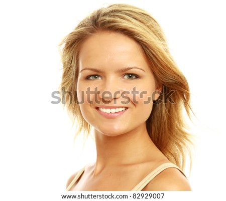 Portrait of successful businesswoman smiling and looking at camera. Isolated on white background.