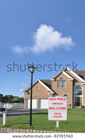 Large Suburban Luxury Home with For Sale, Welcome, Open House Sign on Lush Green Lawn in Late Afternoon