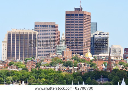 Boston Custom House and Financial district, dome of Massachusetts State House and Beacon Hill from Cambridge, Massachusetts, USA