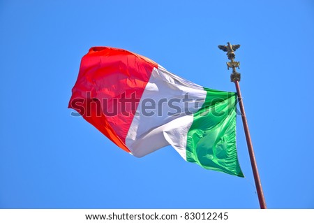 Waving italian flag on a long pole