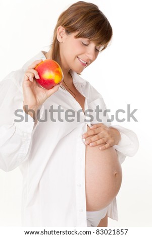 pregnant woman with apple