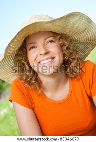 Cute young woman portrait in nature