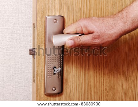 Man open the door, horizontal photo.