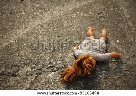 Abandoned Dirty Toy Doll Royalty-Free Stock Photo #83105494