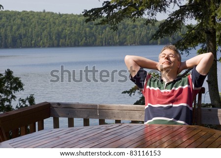 Man relaxing by a lake