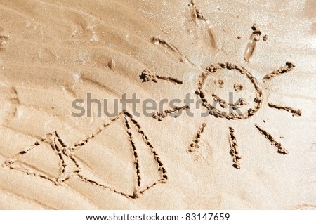 sea beach background with sun and pyramid drawn on sand