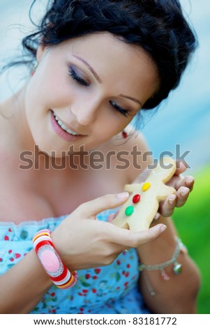 Woman with cookies  man in the hands of