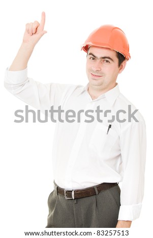 Businessman in helmet pointing up.