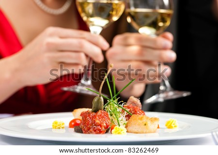 Couple for romantic Dinner or lunch in a gourmet restaurant Royalty-Free Stock Photo #83262469
