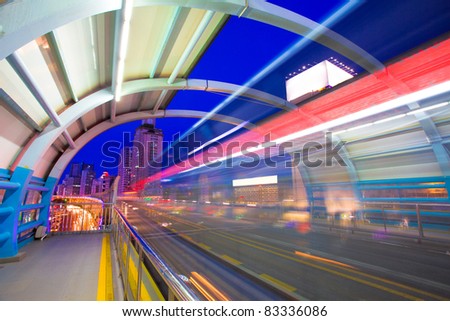 bus through station with blur light Royalty-Free Stock Photo #83336086