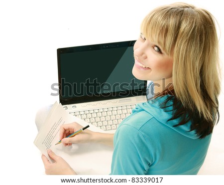 Young woman using laptop isolated on white. Top view.